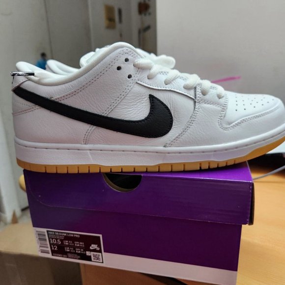 Size 10.5 - Nike SB Dunk Low White Gum (Men's) in hand